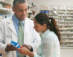 pharmacist helping patient