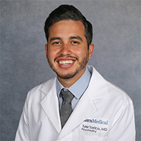 Portrait of ​Tyler Torrico, MD​