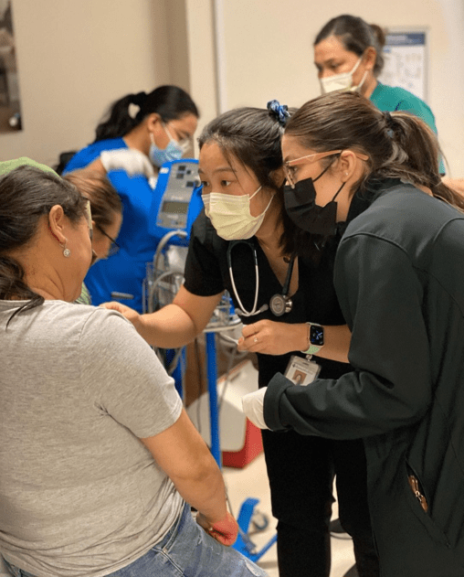 Nurses with patient